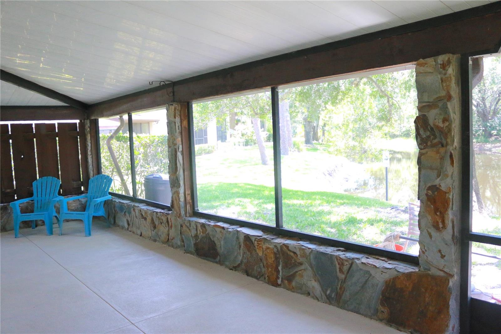VIEW OF POND FROM SCREENED LANAI