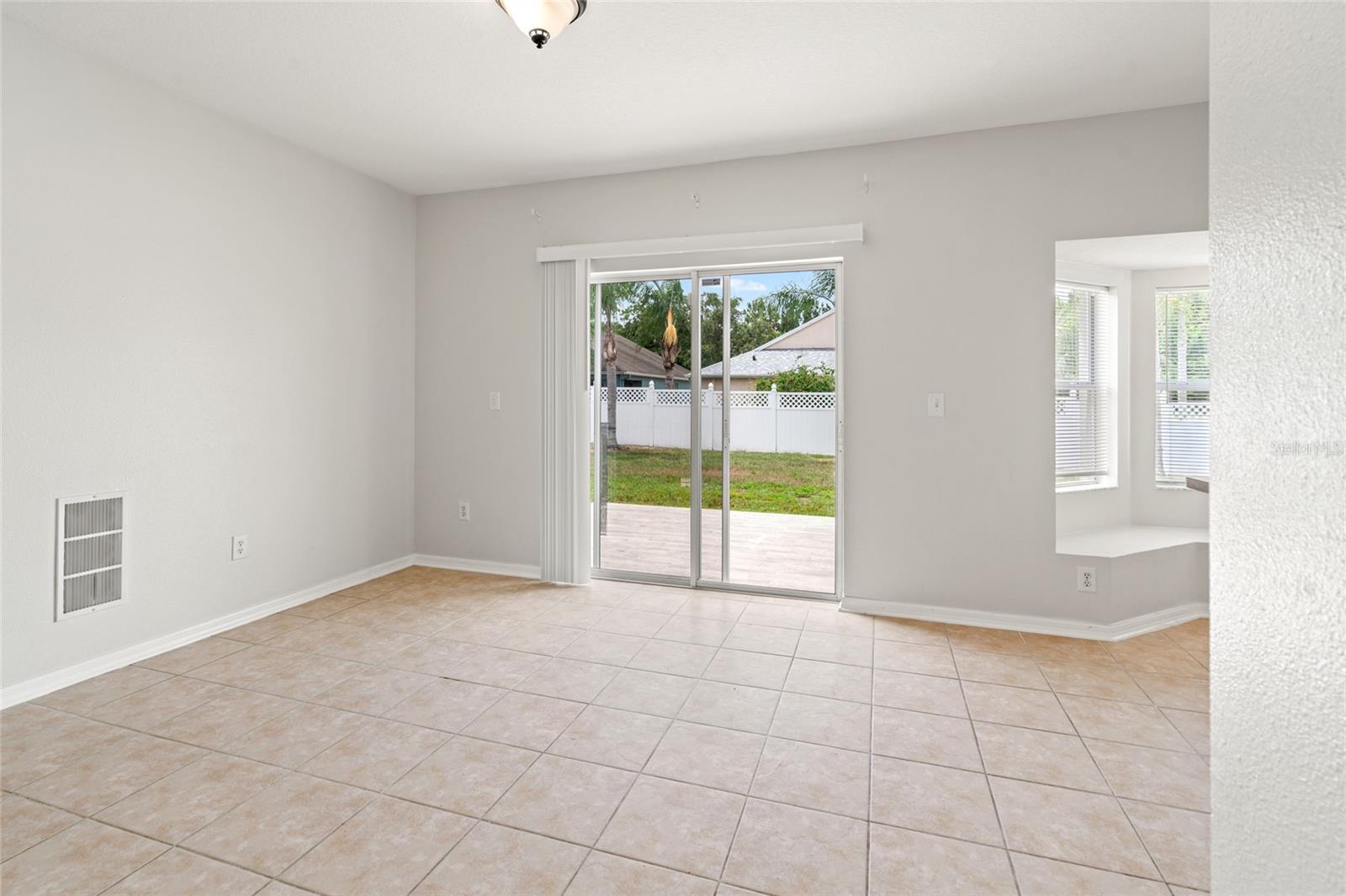 Dining Area and access to fenced in backyard