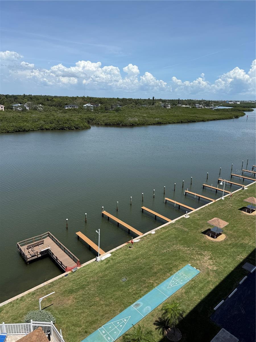 Community fishing pier, shuffle board, and boat docks