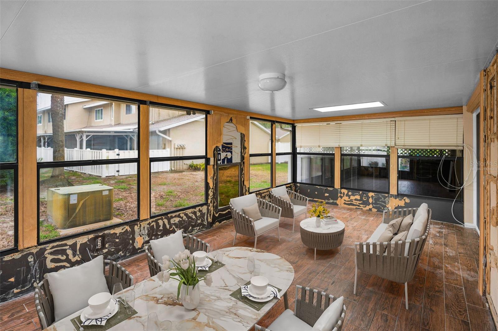 Virtually Staged sunroom...options galore for this space!