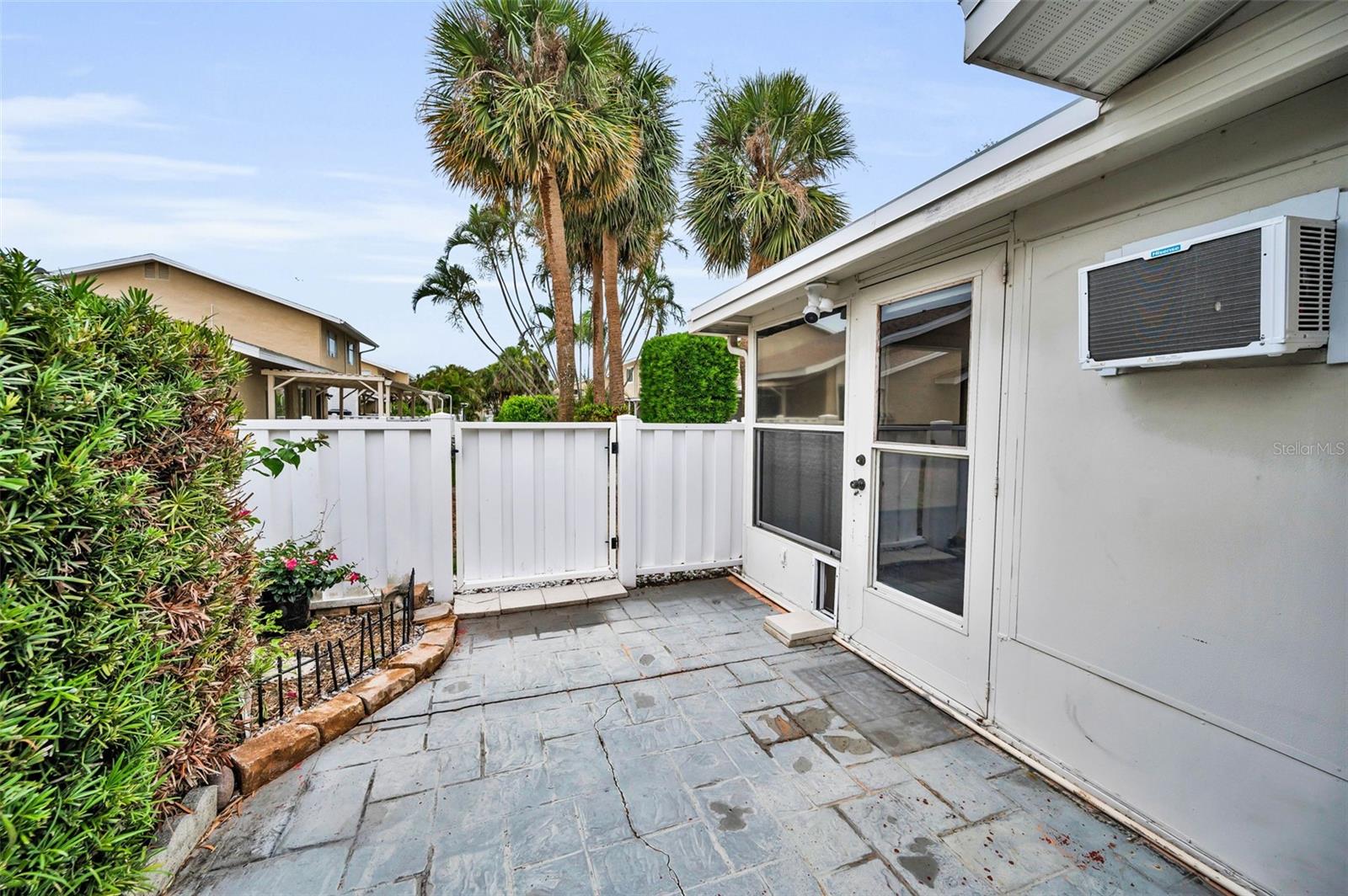 Fenced in private backyard patio perfect for entertaining.