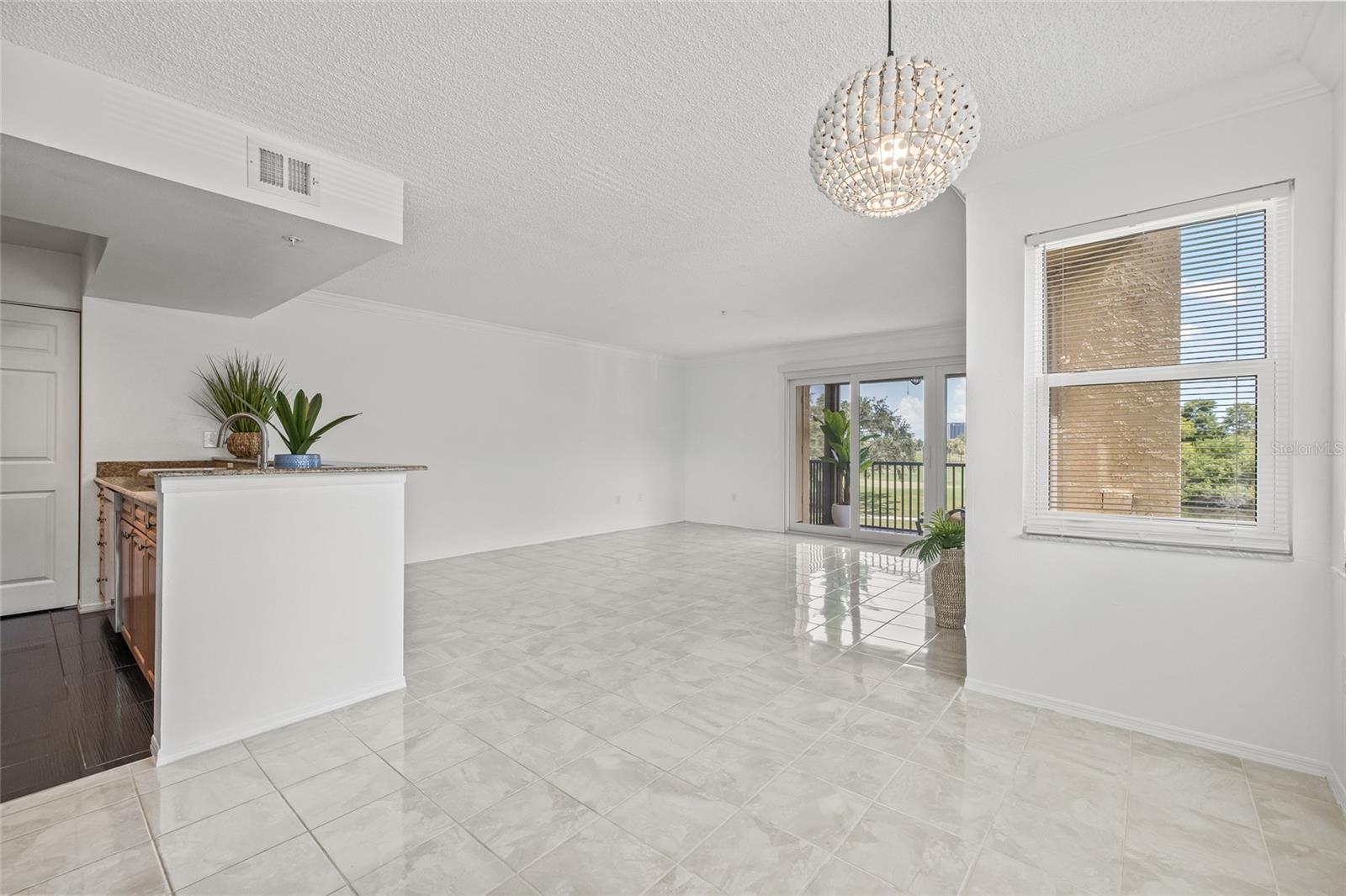 Expansive Great Room with Natural Light. Spacious open-concept layout filled with sunlight and views, ready to be styled to fit your lifestyle.
