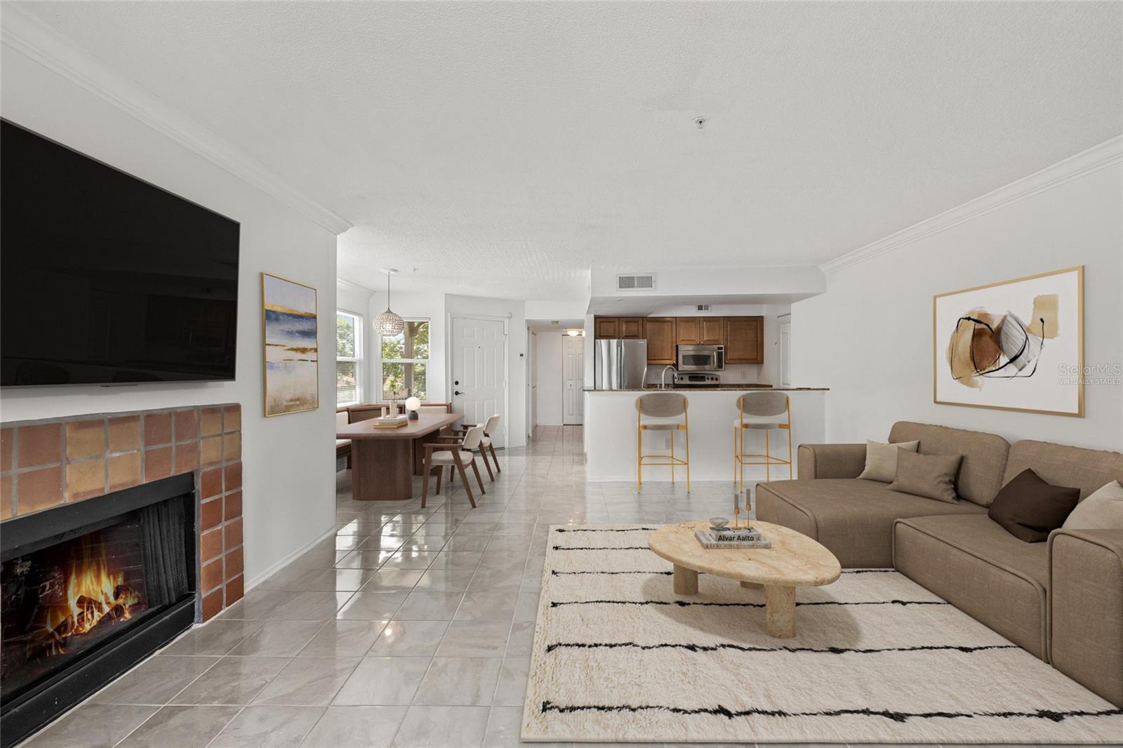 Virtually Staged Open Concept Design. Imagine the possibilities in this open concept living, dining, and kitchen area—perfect for relaxing, entertaining, or gathering with friends.