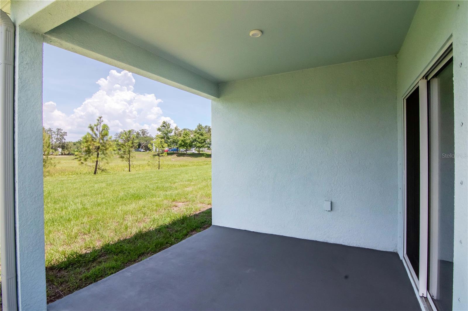 Private covered patio for enterrtaining or relaxing