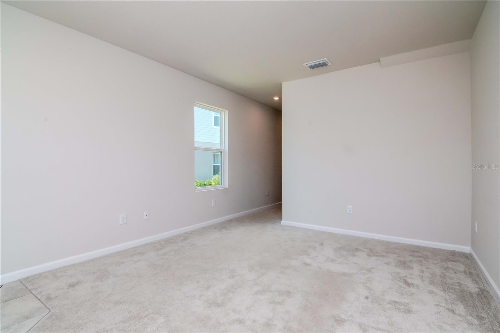 Living room looking towards kitchen & dining room