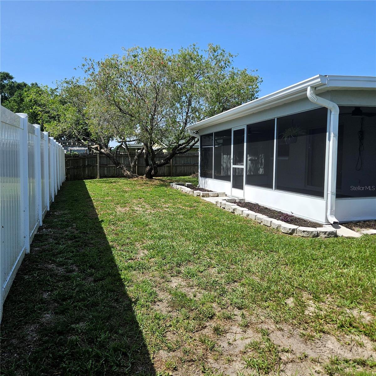 Lots of room in the back and side yard. New Vinyl fence.