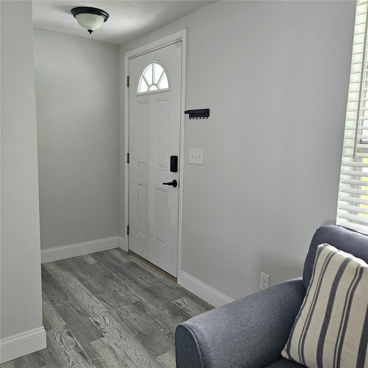 Entrance with coat closet.