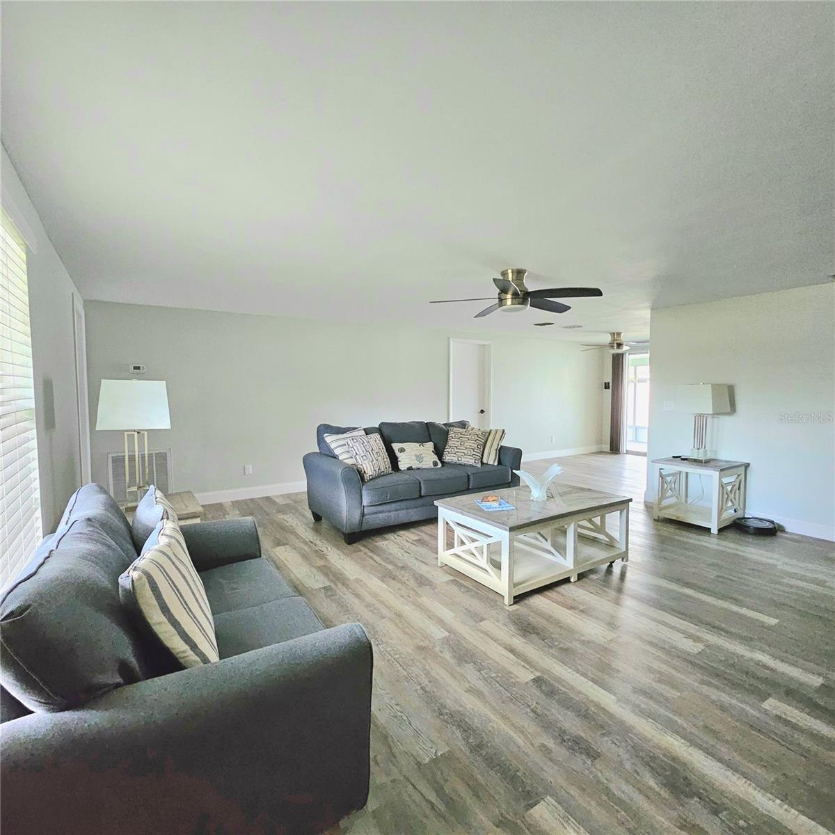 Living room remodeled. Popcorn ceiling removed.