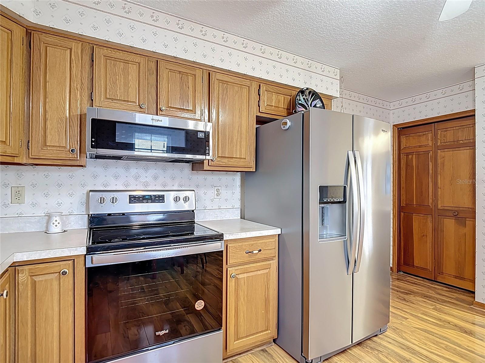 Kitchen with new stainless steel appliances