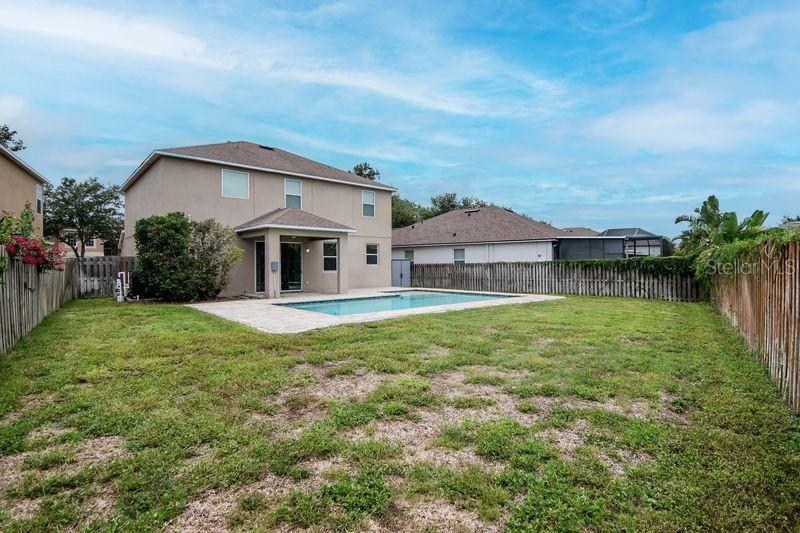 Huge fully fenced backyard with plenty of room to roam, play and design your own haven.
