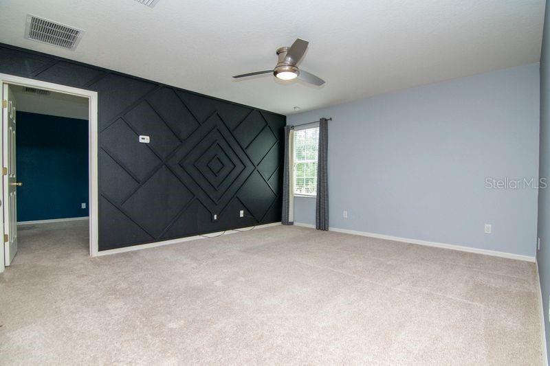 Goregeous accent wall with wainscoting.