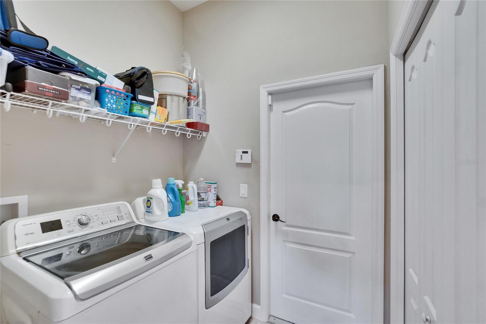Laundry Room with closet