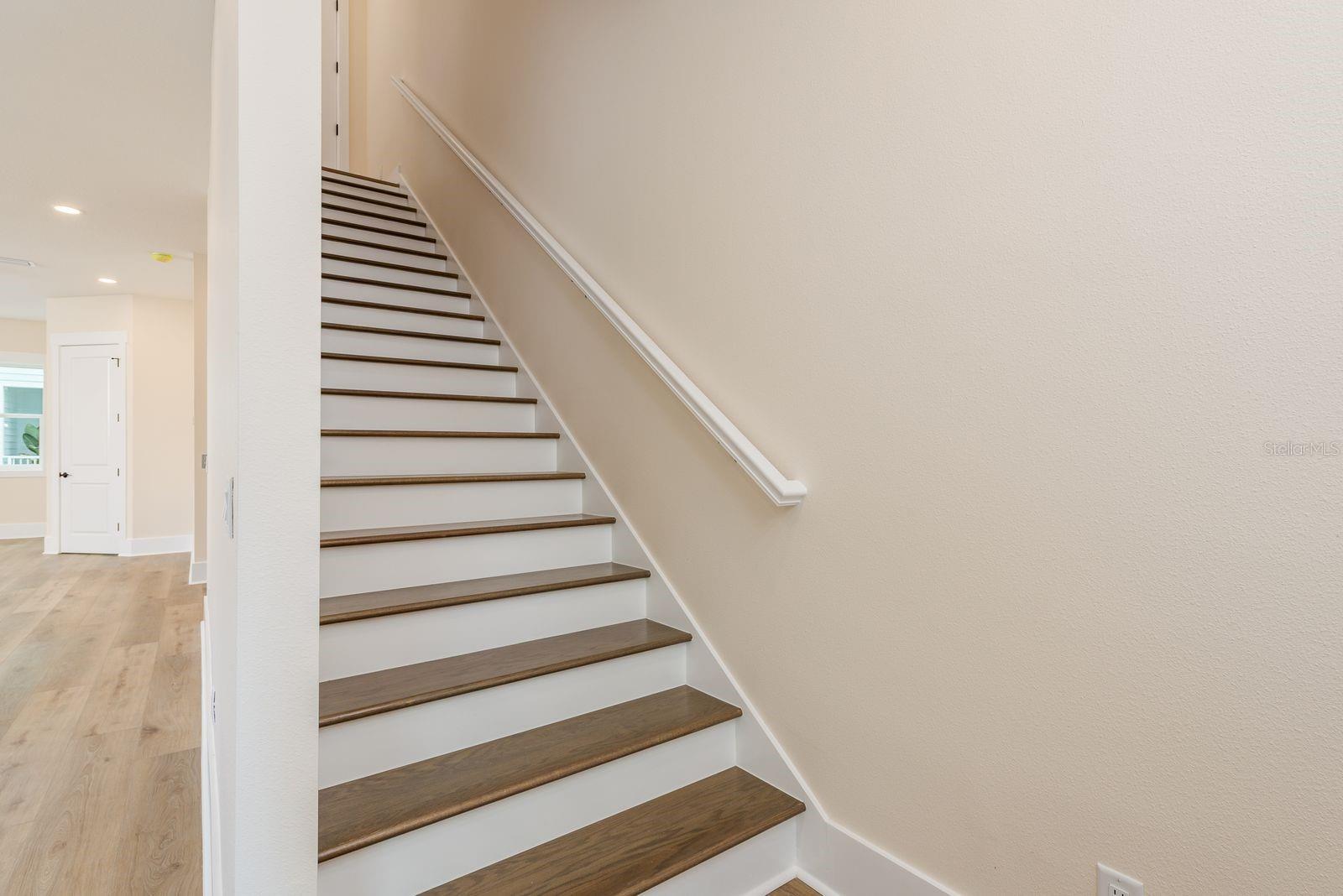 2nd level staircase leading to 3rd floor