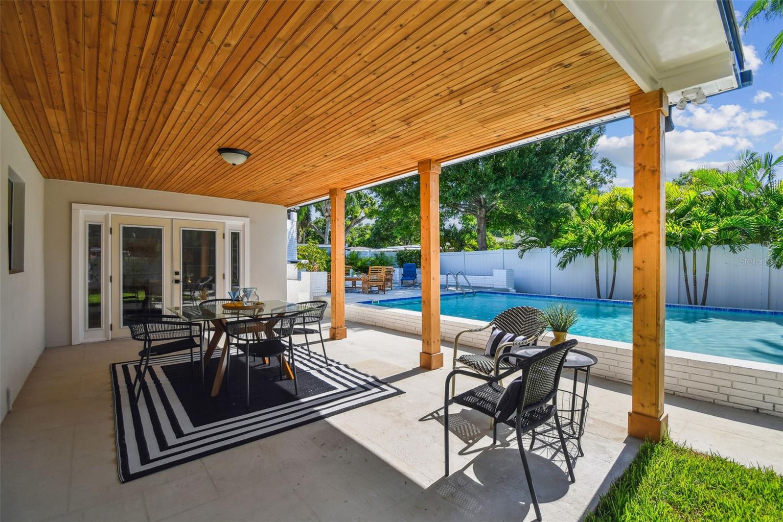 Franch door from family room lead to porch by the pool!