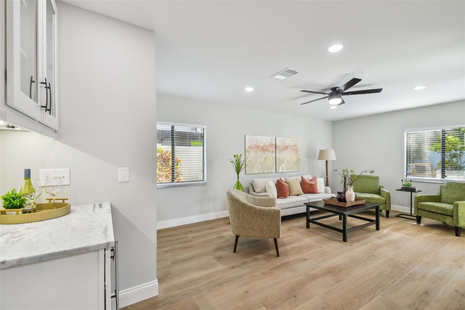 The dry bar with wine fridge is conveniently located next to the family room and kicthen for easy entertaining!