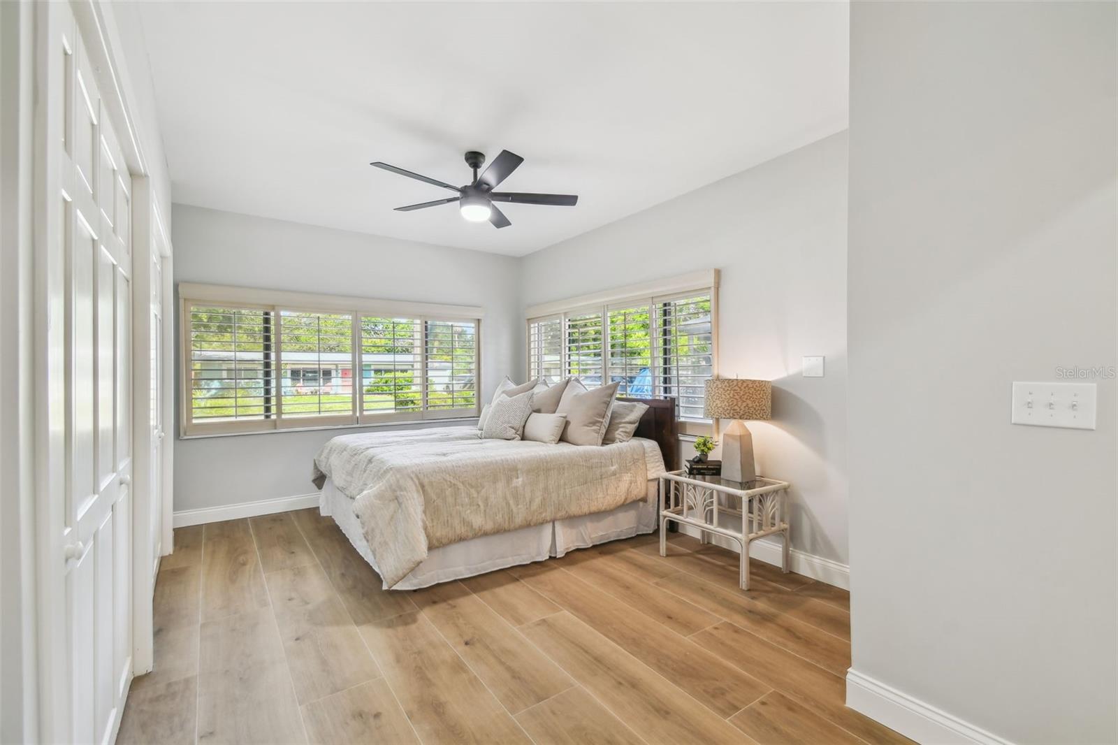 This spacious Primary suite has plenty of room for a king bed, dressers and double closets and features a new en-suite bath
