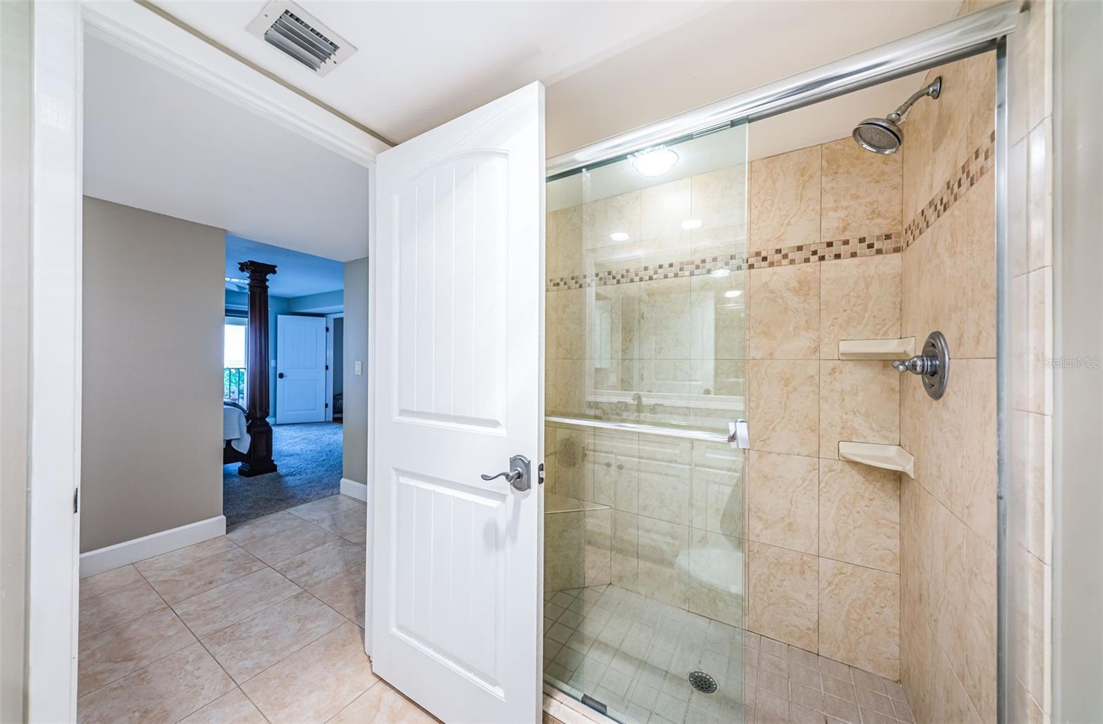 Large walk-in shower in primary bathroom
