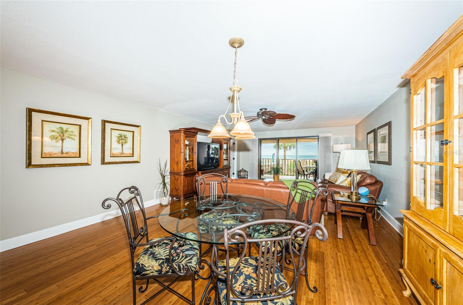 Dining area looking towards living room and slider to Gulf Front Balcony