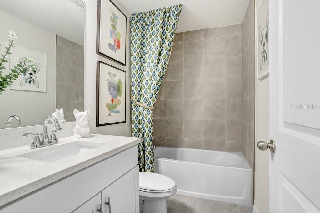 Convenient Downstairs Full Bath for Guests! (photo of model home)