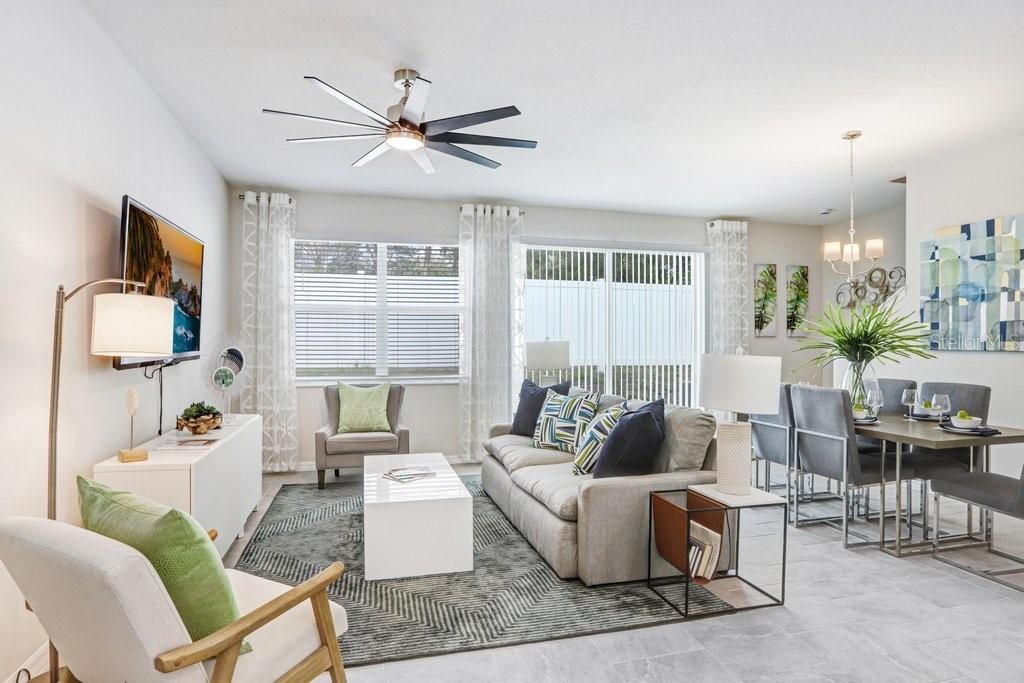 Open Dining and Living Areas! (photo of model home)