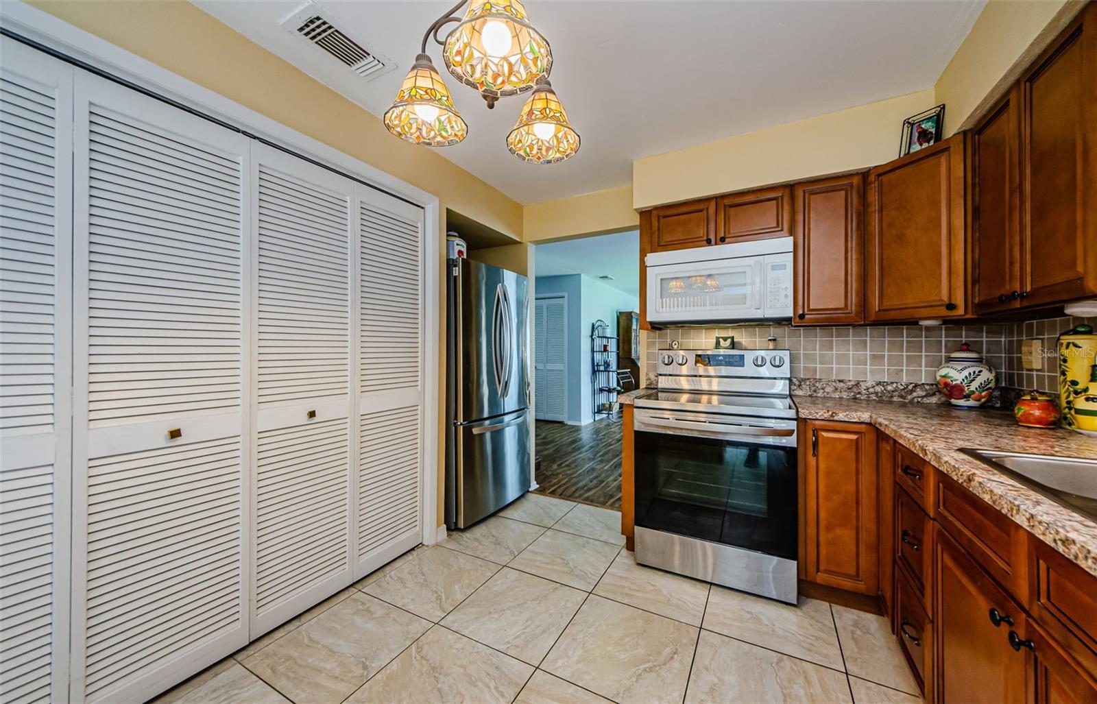 Laundry closet including full size washer and dryer