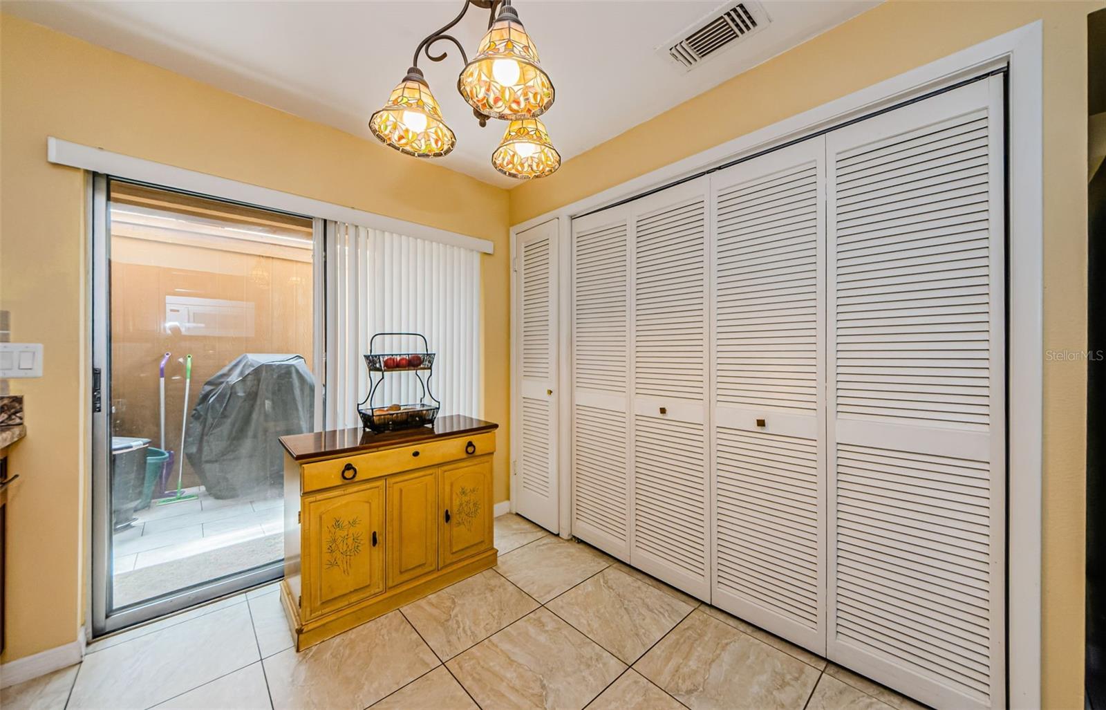 Easy access through the sliding glass doors to rear lanai and covered carport