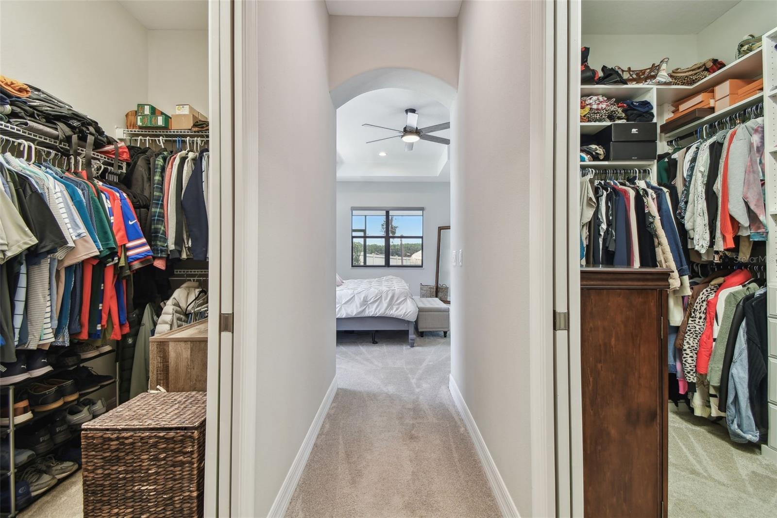 His and Hers Primary Bedroom walk in closets