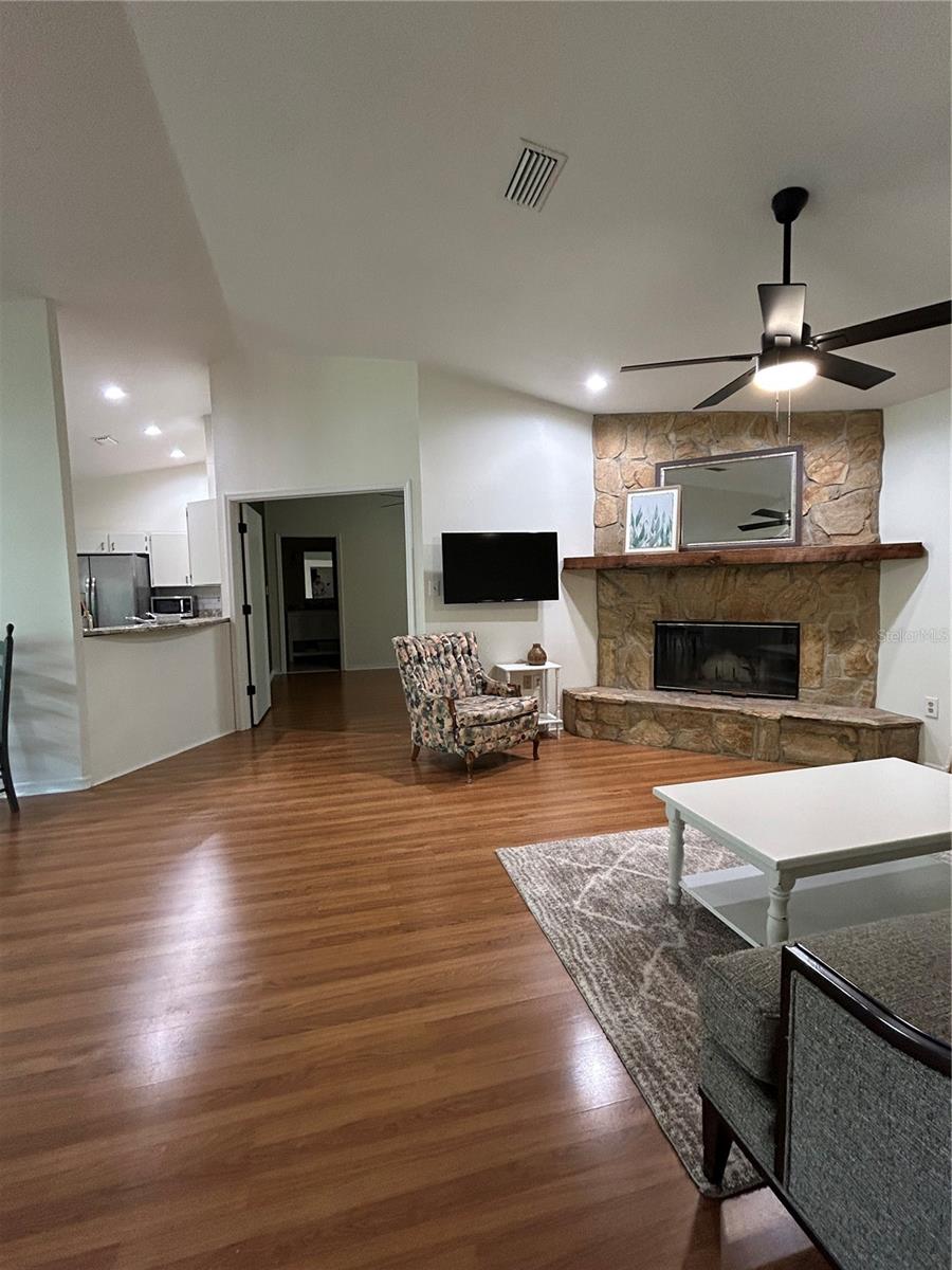 New fan and recessed lights in kitchen and family area