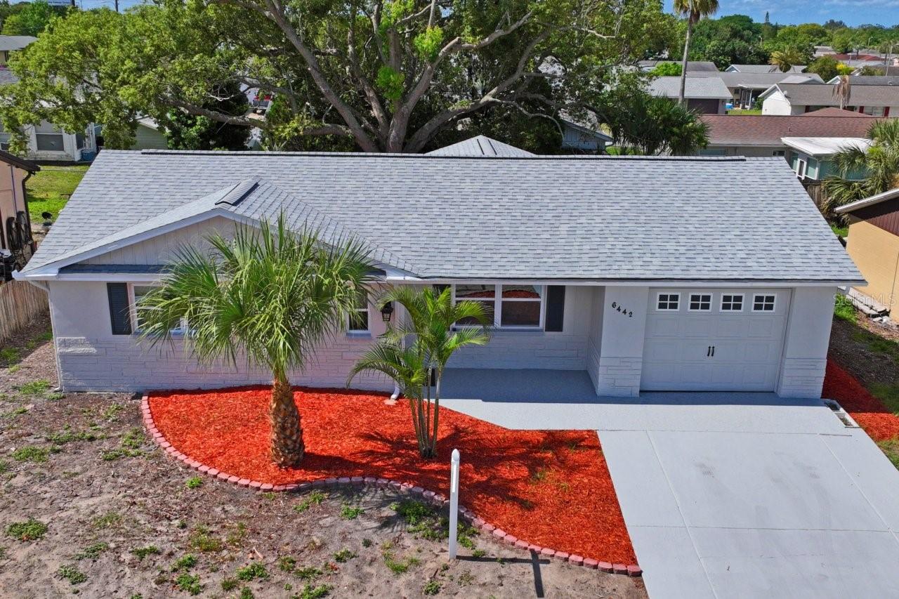 Aerial view of new roof and landscapting