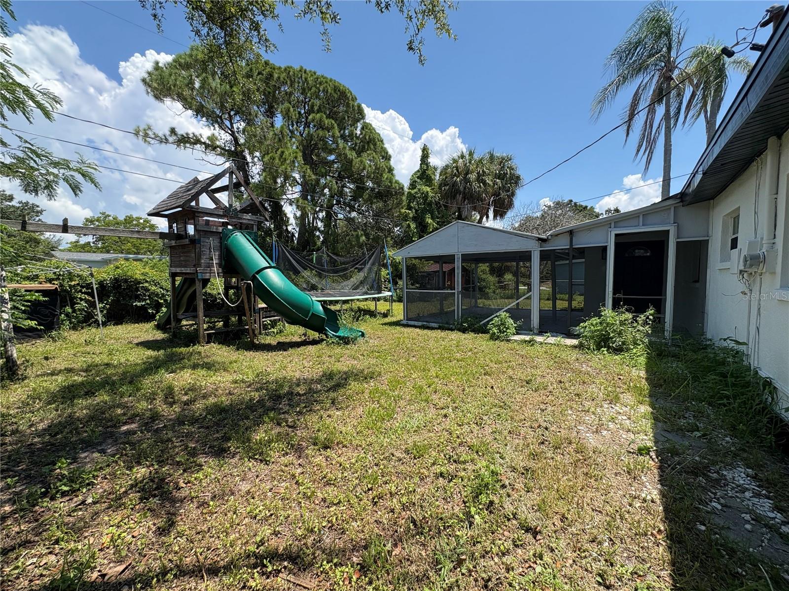 Trampoline and Kid's Swingset