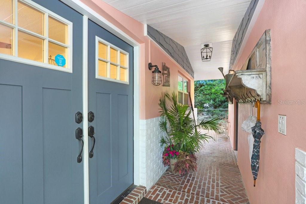Front door and Detached Garage Entrance