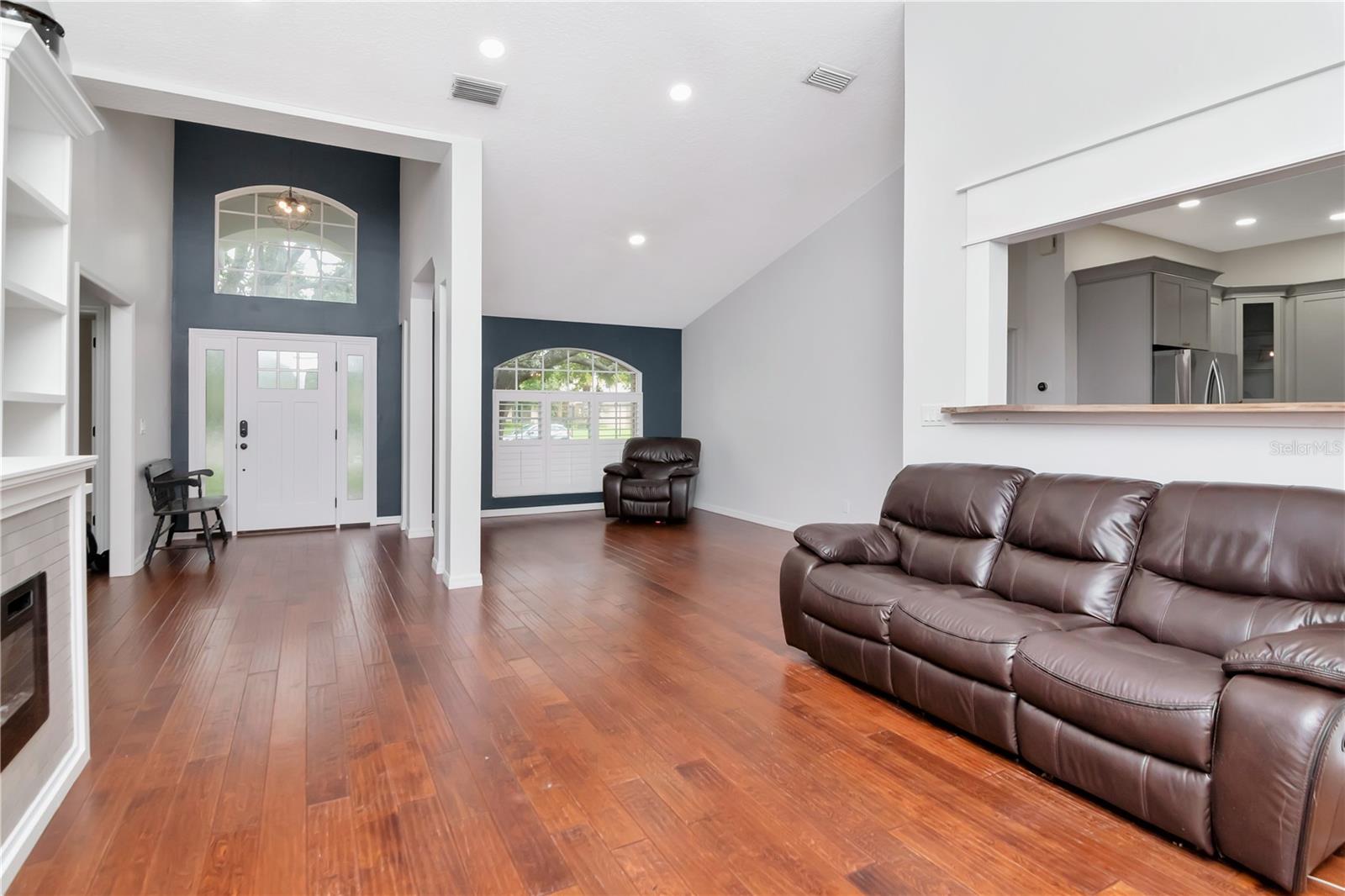 Entry - Flex Space -Livingroom with Custom Built Ins and Lanai Access