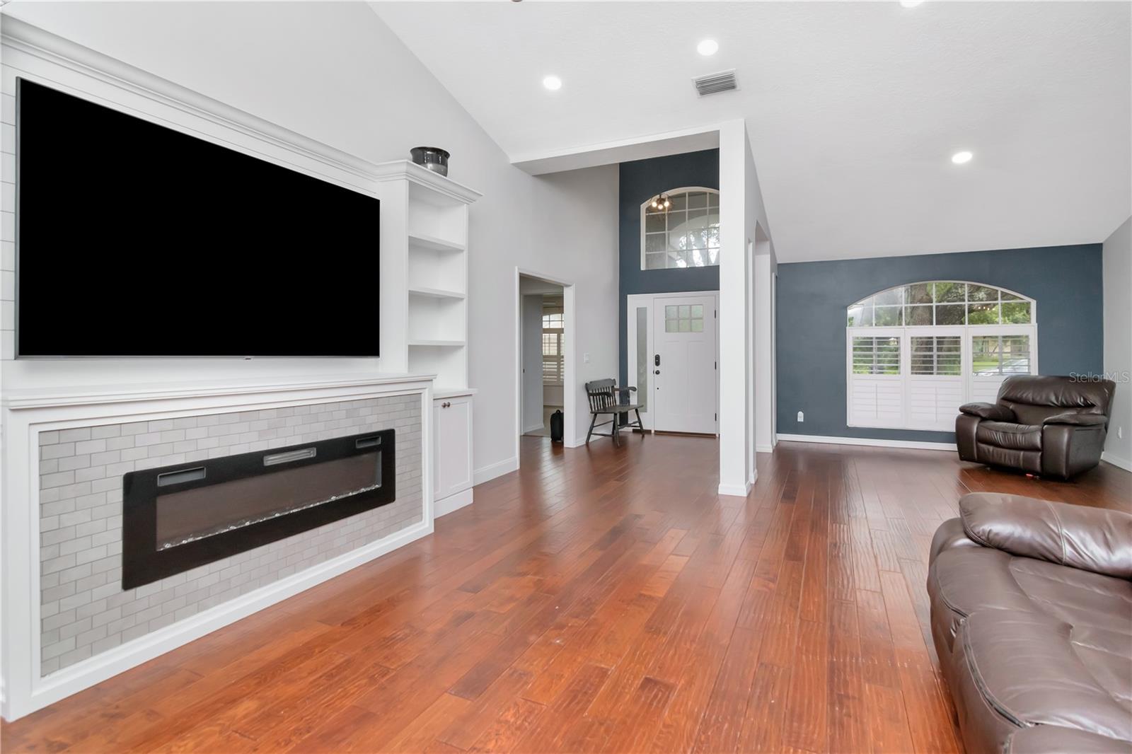 Entry - Flex Space -Livingroom with Custom Built Ins and Lanai Access