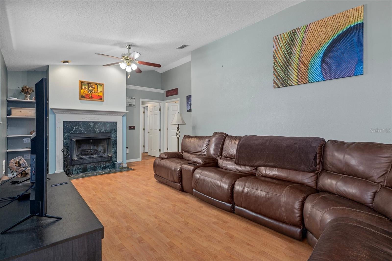 Another view of family room to kitchen.