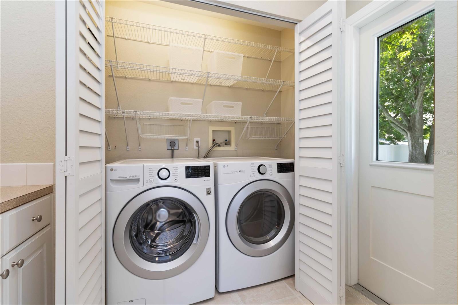 Indoor laundry room with washer and dryer.