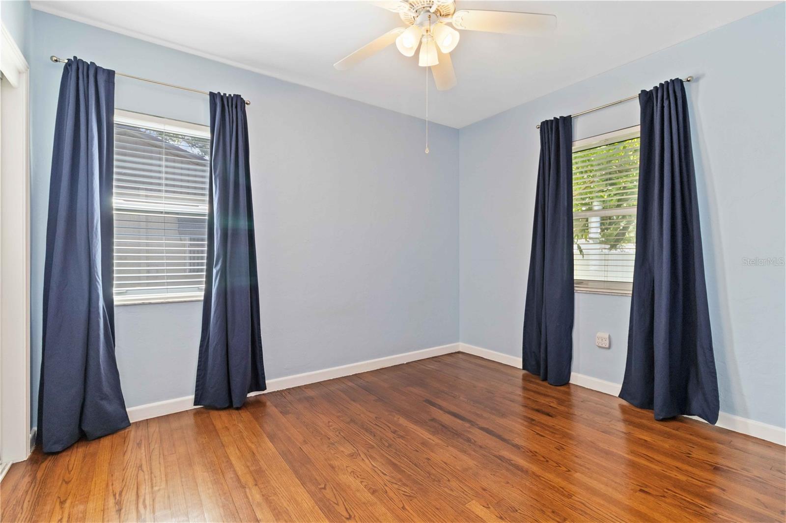 Second bedroom also has gorgeous wood floors.