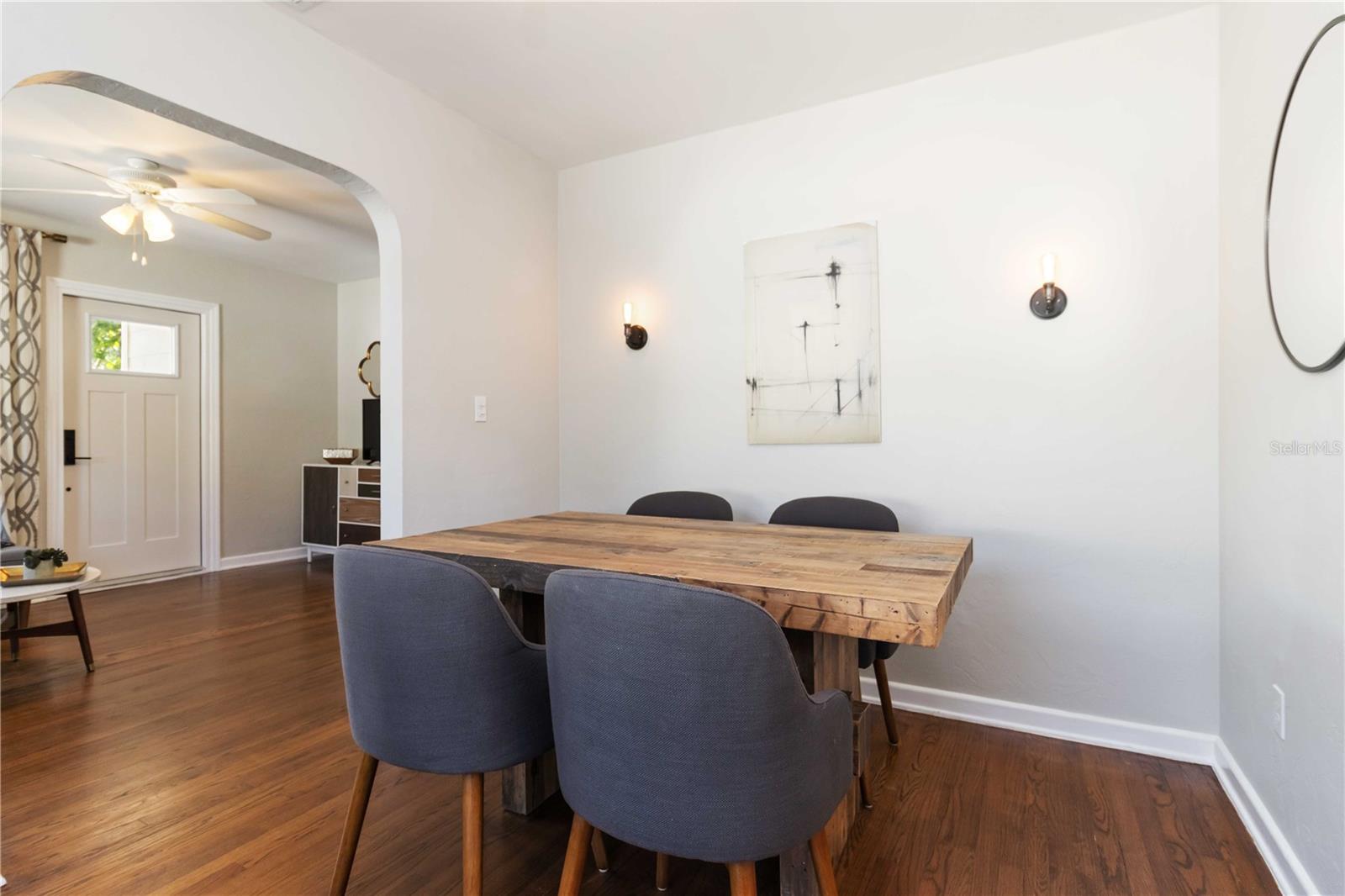 Formal dining room between the living room and kitchen.