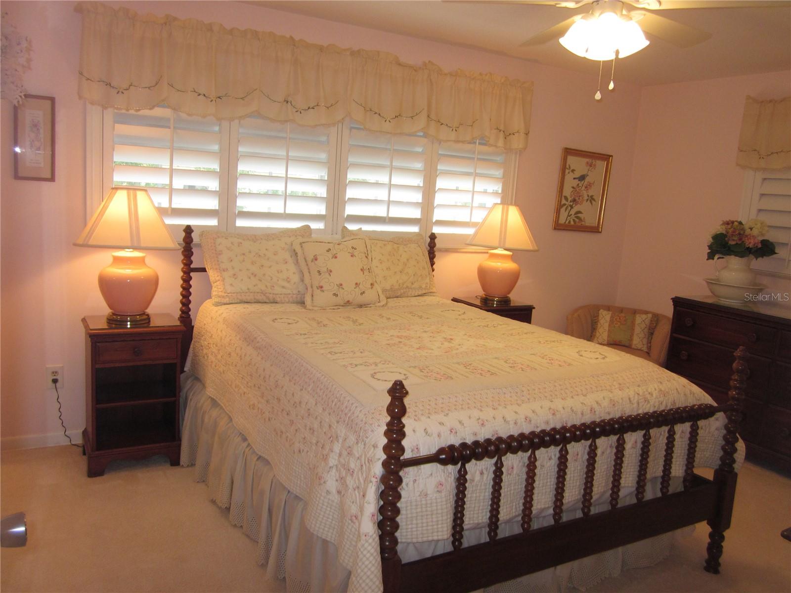 Bedroom #4 also with attractive plantation shutters.