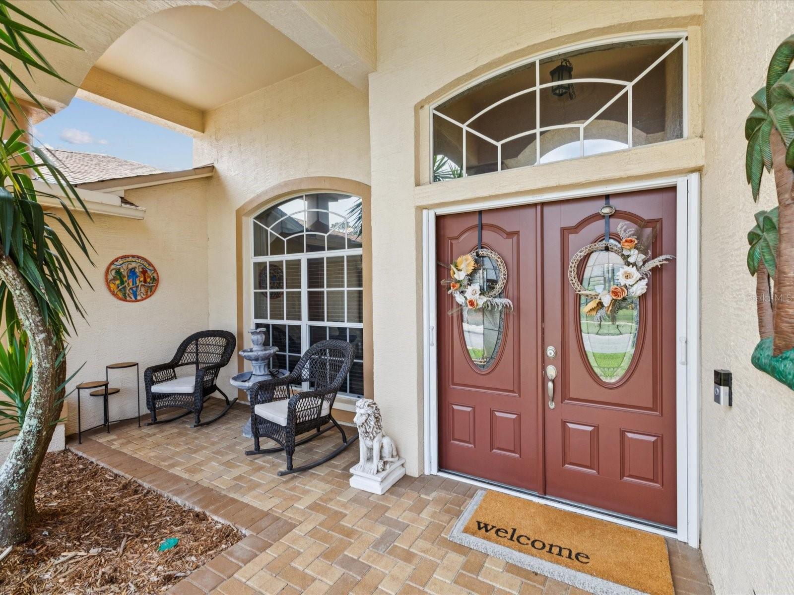 FRONT DOOR AND PRIVATE SITTING AREA