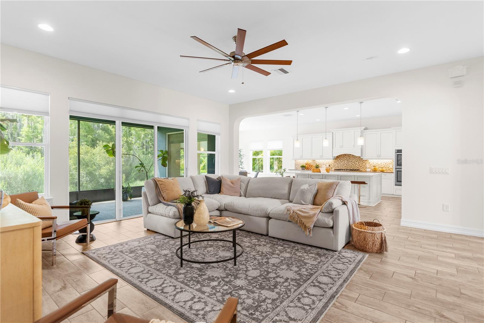 Family room with views to kitchen and lanai