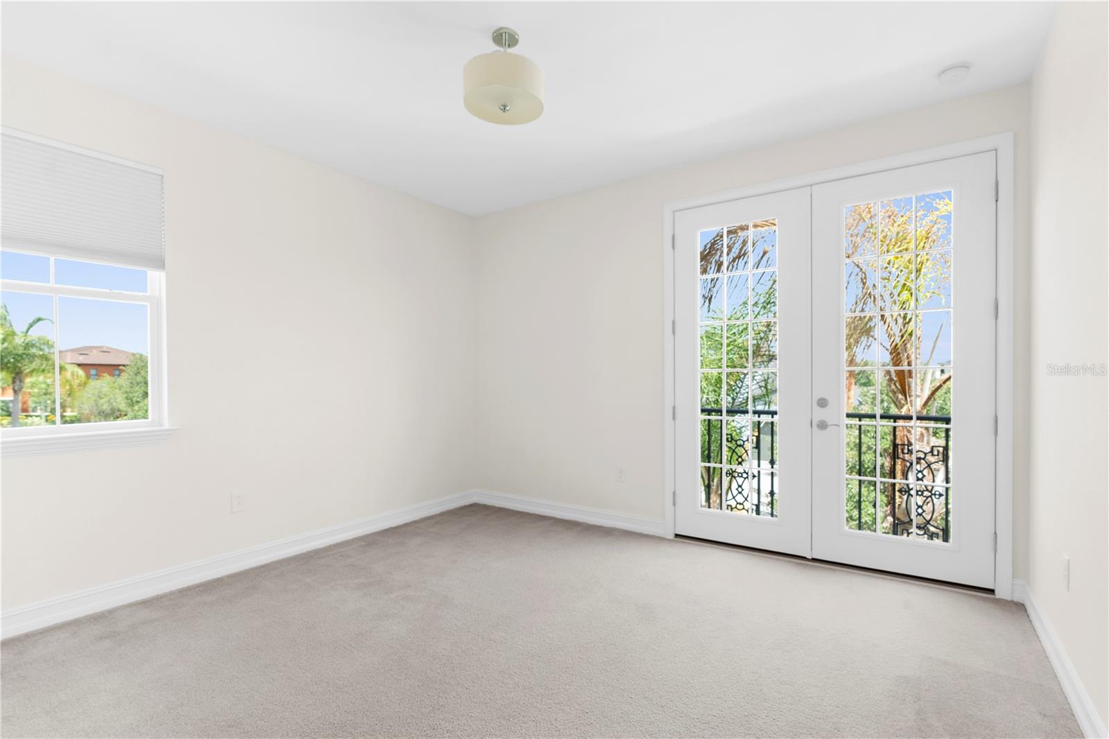 Upstairs bedroom with juliet balcony