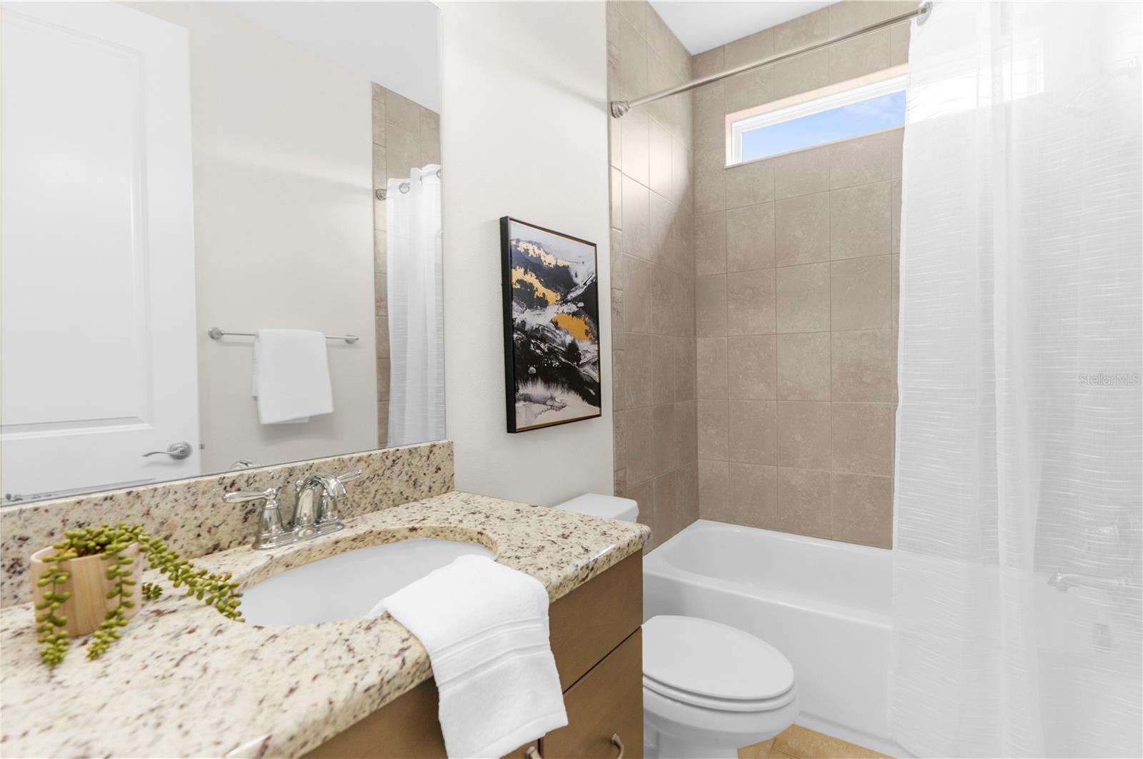 Downstairs guest suite full bathroom