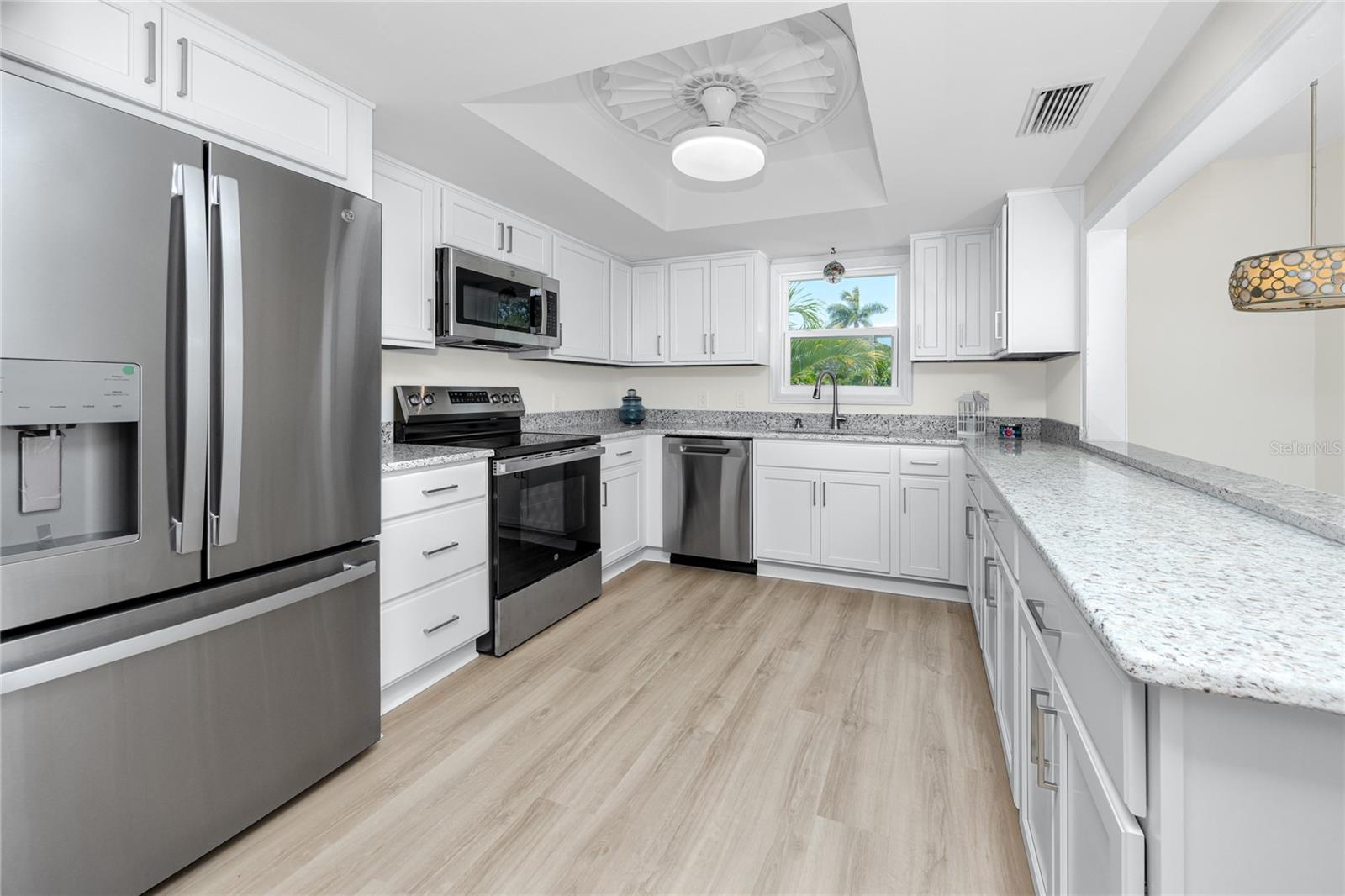 Kitchen with new SS GE appliances