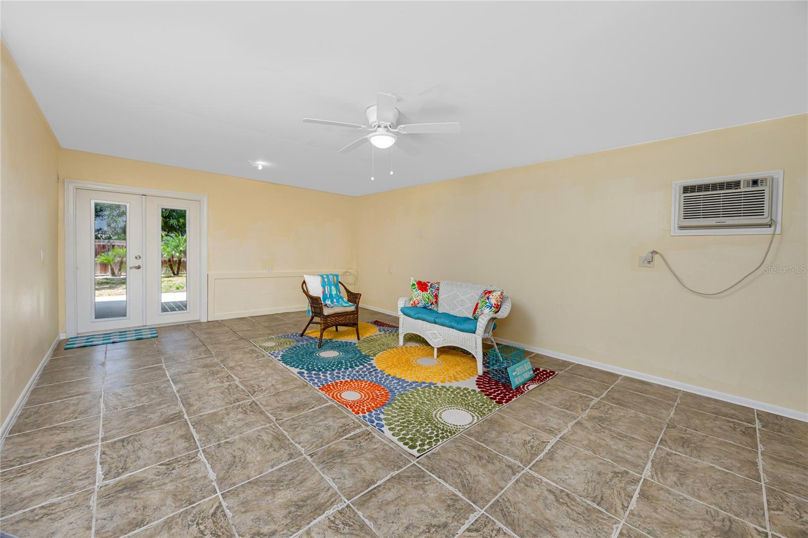 Downstairs FR with entry to back yard