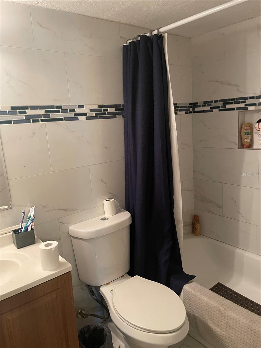 UPDATED BATHROOM TILE TOP TO BOTTOM