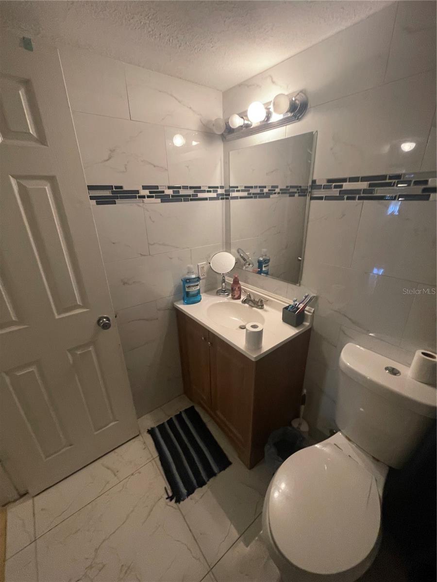 UPDATED BATHROOM TILE TOP TO BOTTOM