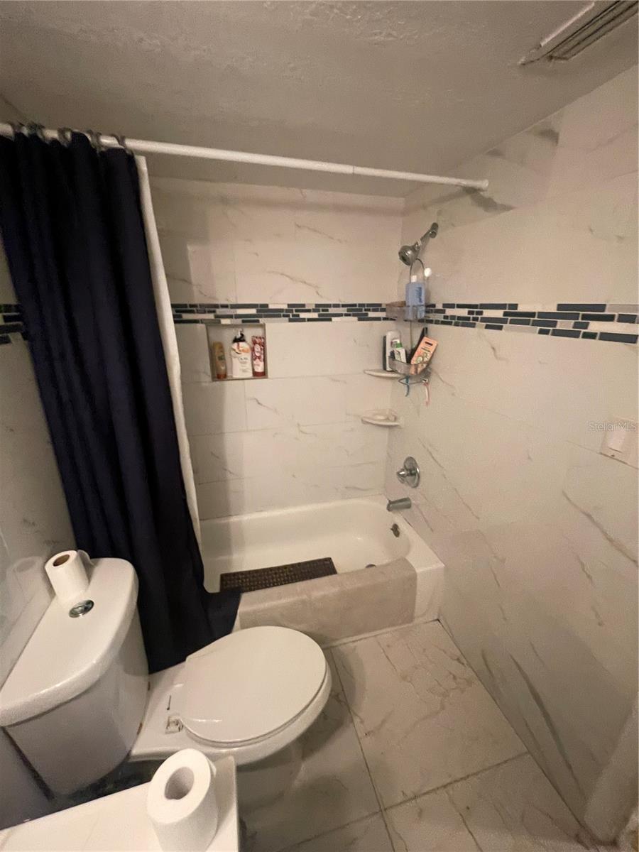 UPDATED BATHROOM TILE TOP TO BOTTOM