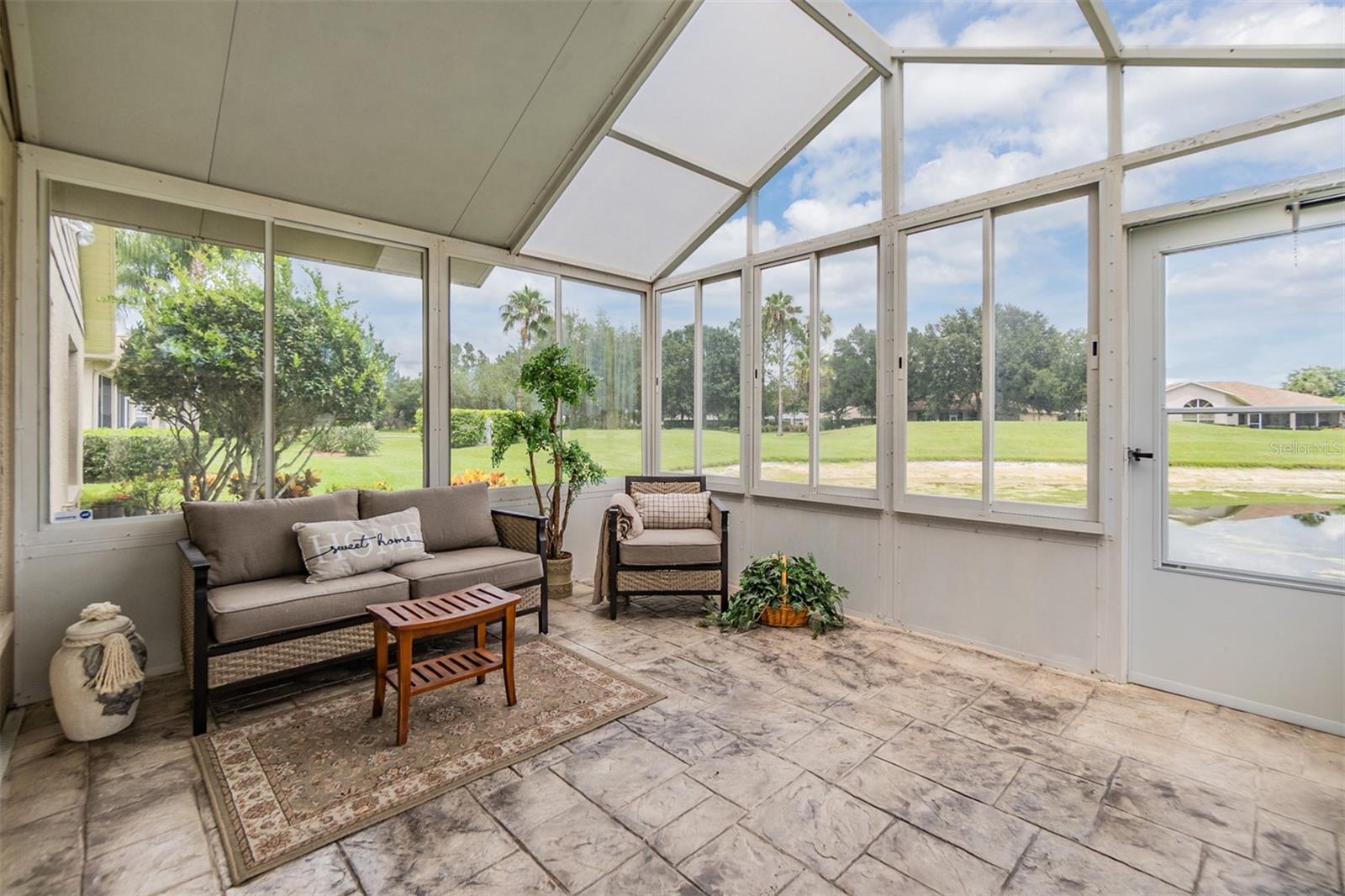 Get used to this lanai with pond views