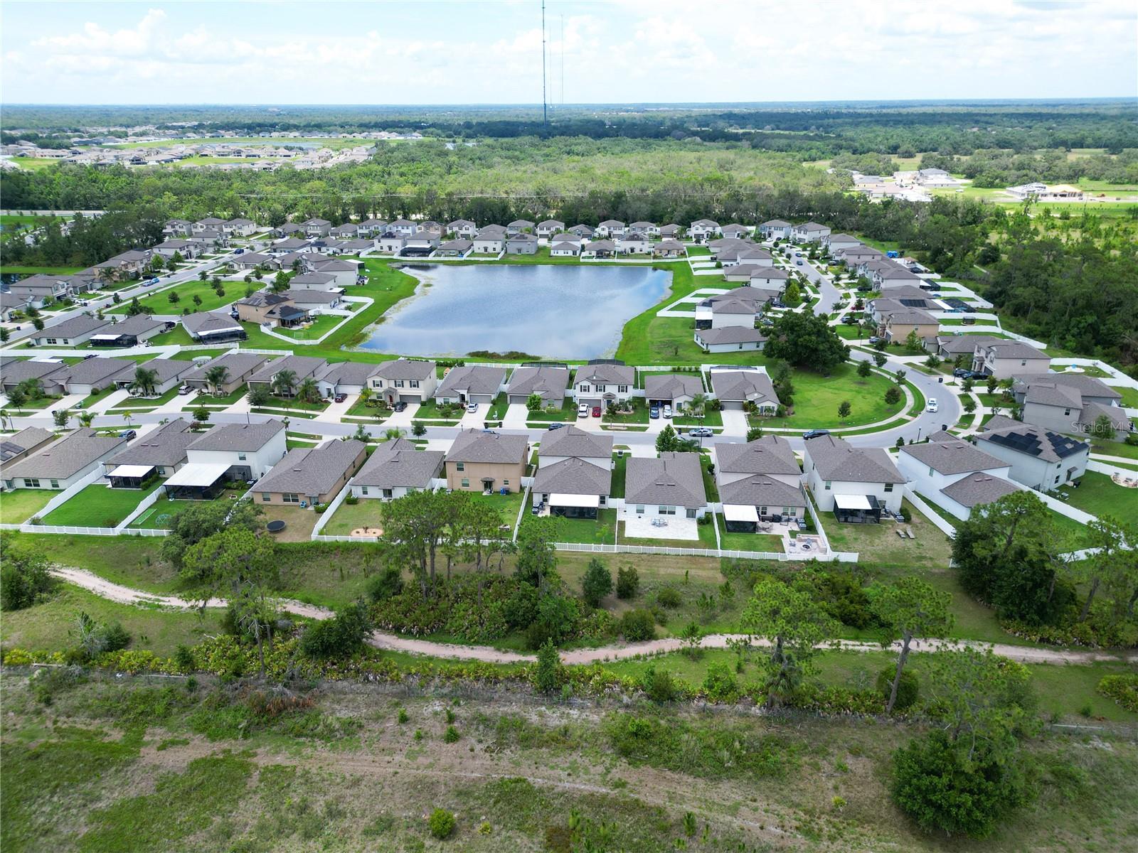 Aerial of neighborhood and walking trail