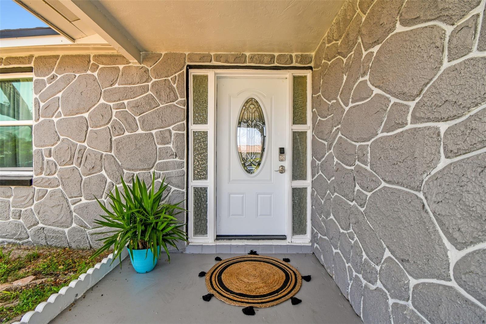 Front door- Installed 2022. Keypad code entry.